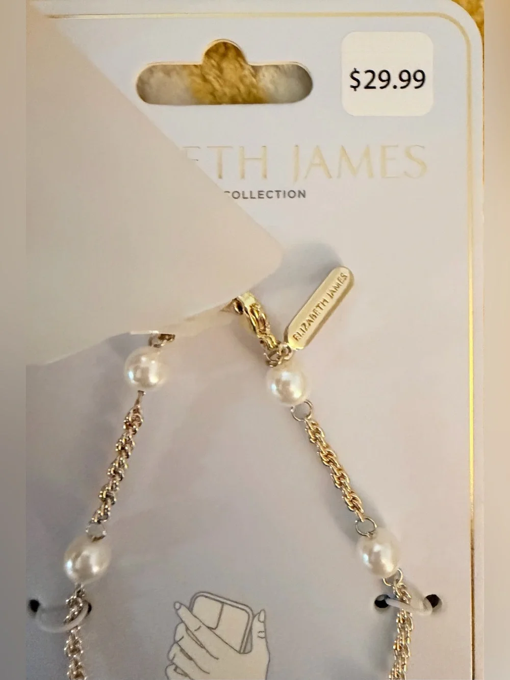 NWT Elizabeth and James Gold and White Beaded Phone Charm Strap w. Bow Detail